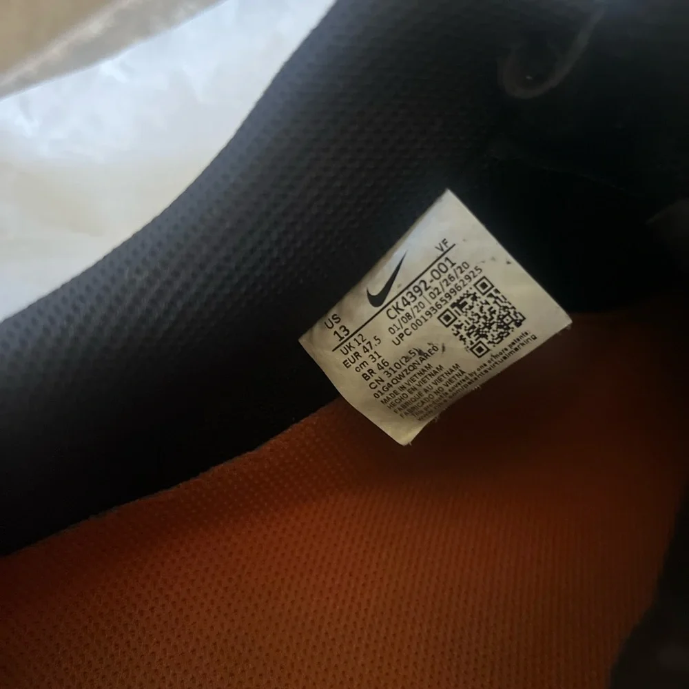 Nike Black Sneakers with Orange Detail